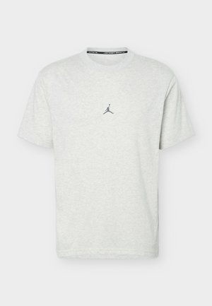 Ανοιχτό γκρι κοντομάνικο T-shirt με στρογγυλή λαιμόκοψη και μικρό σκούρο γκρι λογότυπο Jumpman στο κέντρο του στήθους.