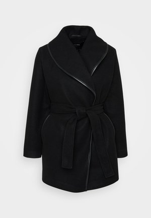 Manteau en laine noir avec ceinture, col large et détails en cuir, manches longues et poches avant sur un fond blanc.