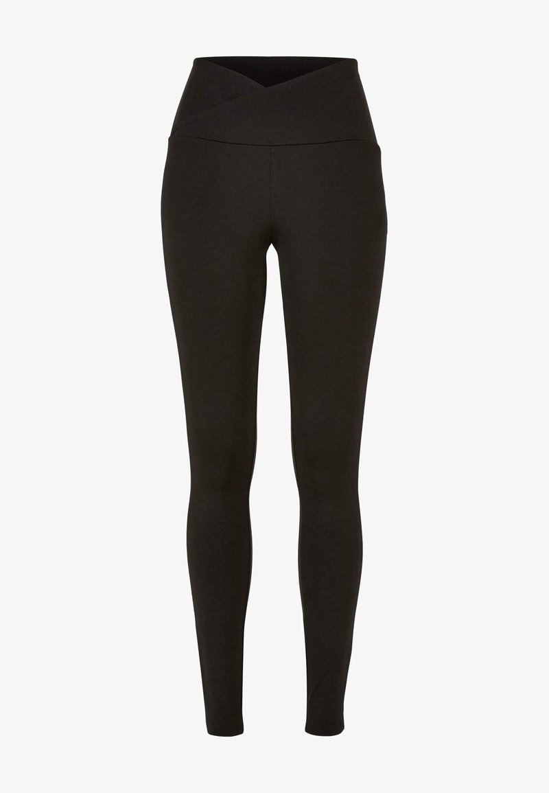 Leggings noirs avec une taille haute et croisée. Fabriqués dans un tissu extensible et lisse, ils présentent un design ajusté sans coutures visibles.