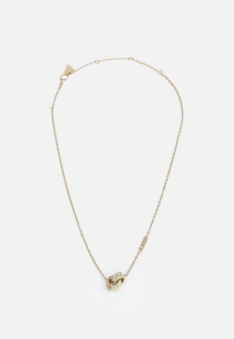 Gouden halsketting met een delicate ketting en een centraal knoopontwerp met een kleine heldere edelsteen. Gestucteerde accenten op de ketting voegen detail toe.