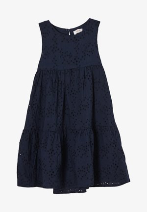 Robe sans manches bleu marine avec un col rond, présentant des détails en œillets et une jupe à volants. Tissu doux, silhouette évasée. Fermeture à boutons au dos.