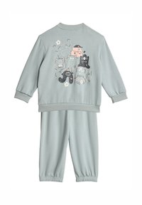 Svetlomodrý bavlnený športový úbor s mikinou a nohavicami s elastickým pásom. Mikina má farebnú potlač rozprávkového charakteru.