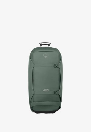 Green rolling backpack with a reinforced base, adjustable straps, and an extendable handle. Features a logo and a buckle closure.