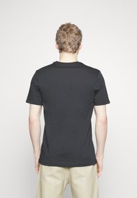 Nike Sportswear T-shirt med print - black