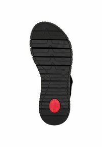 Schwarze Gummisohle mit strukturiertem Muster für Grip, mit einem roten kreisförmigen Akzent, der in der Nähe der Ferse mit "Komfort" beschriftet ist. Größe 37.