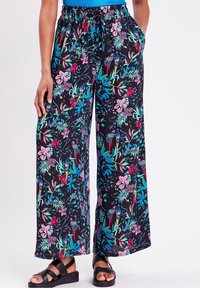 Floral wide-leg pants in black, featuring vibrant pink and teal patterns. Made of lightweight fabric with an elastic waistband and side pockets.