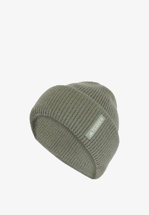 Knitted olive green beanie hat featuring a folded cuff and a small gray branded patch with the "TERREX" logo.