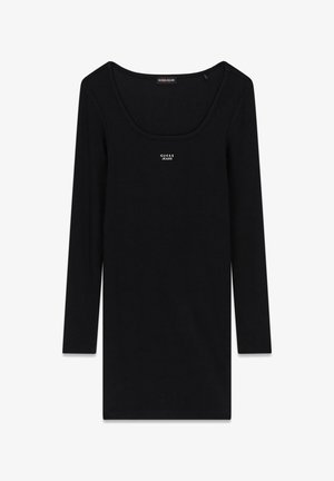 Fekete, hosszú ujjú póló, lekerekített nyakkivágással és testhez simuló fazonnal. Kicsi, fehér "GUESS JEANS" logóval a mellkasán. Puha szövet textúra.