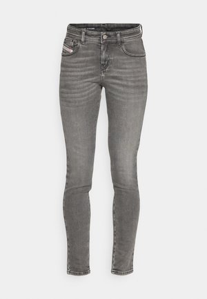 Jeans skinny din denim gri, cu talie medie, design cu cinci buzunare și estompare subtilă pe față. Prezintă un nasture și un fermoar din metal.
