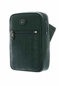 Lacoste NOMOGRAMME - Taška s příčným popruhem - sinople