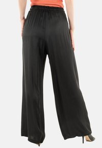 PLEASE Pantaloni - noir