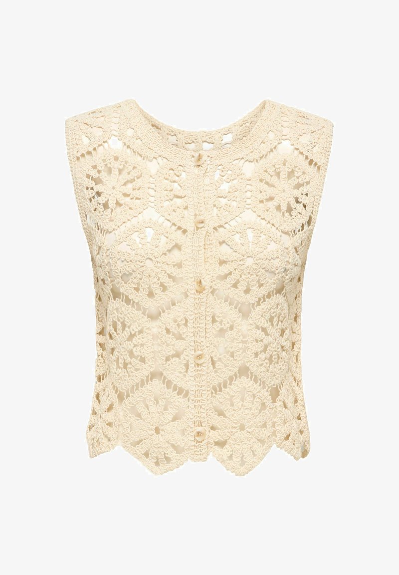 Gilet beige sans manches en crochet avec motifs floraux et fermeture boutonnée sur le devant.
