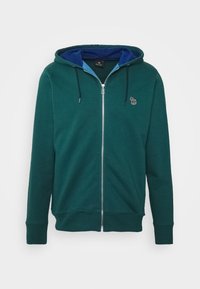 Grüne Zip-Hoodie mit blauer Innenauskleidung, Kapuze mit Kordelzug und gesticktem Logo auf der Brust. Hergestellt aus weichem, warmem Stoff.