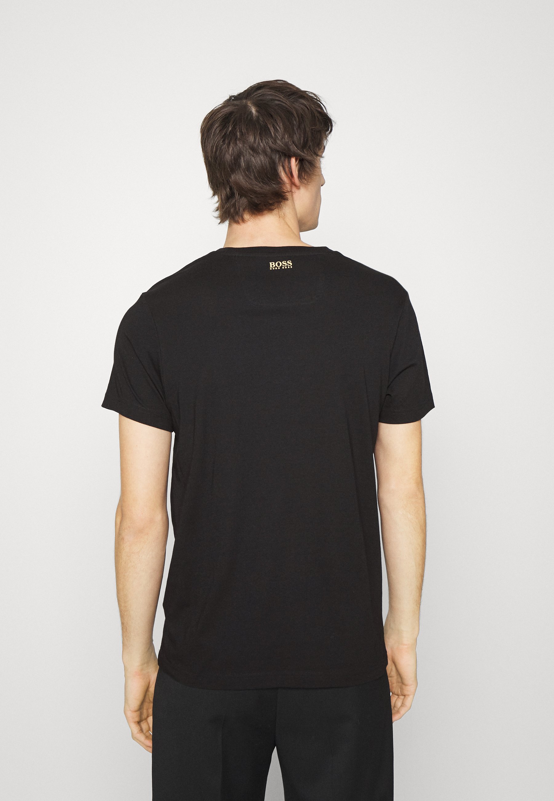 BOSS TEE - T-shirt print - black/gold 