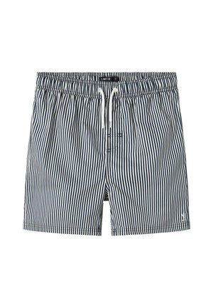 Pantaloni da bagno a righe blu navy e bianchi con vita elasticizzata, cordino e una piccola tasca sul retro. Realizzati in tessuto leggero.