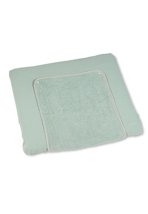 Soft rectangular baby changing mat in pale green with removable textured towel insert and rounded corners.