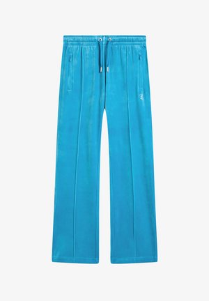 Pantaloni tuta turchesi realizzati in tessuto morbido, con una vita elastica dotata di laccetti e due tasche laterali con cerniera.