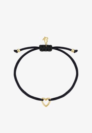 Pulsera negra ajustable de cordón con un pequeño colgante de corazón dorado en el centro y extremos con cuentas doradas.