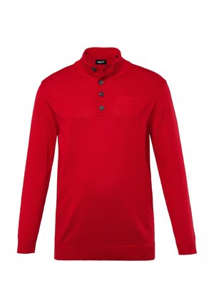 Czerwony sweter z dzianiny z prążkowanym kołnierzem, zapięciem na guziki i długimi rękawami. Posiada wytłoczone logo na piersi.