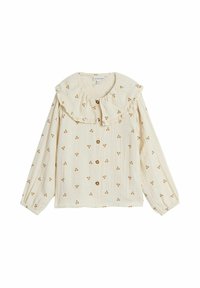 Krämfärgad blus med en volangkrage, prydd med små blommönster. Har knappar på framsidan och långa, elastiska ärmar.