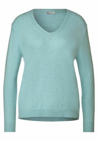 V-Ausschnitt-Pullover in Hellblau, aus weichem, strukturiertem Stoff gefertigt. Verfügt über lange Ärmel sowie gerippte Bündchen und Saum für einen figurbetonten Look.