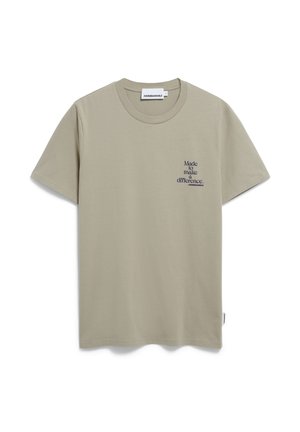 Light green cotton T-shirt with short sleeves, crew neck, and blue printed text on the left chest saying, "Made to make a difference."