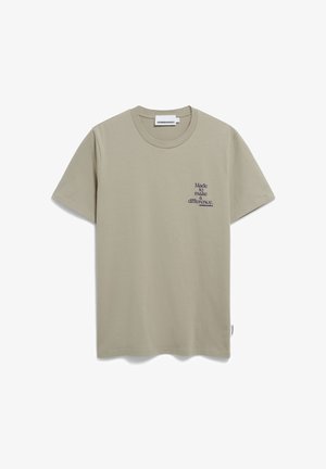 Hellgrünes Baumwoll-T-Shirt mit kurzen Ärmeln, Rundhalsausschnitt und blauer Druckschrift auf der linken Brust mit der Aufschrift: "Wurde gemacht, um einen Unterschied zu machen."