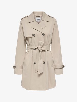 Beżowy dwurzędowy płaszcz trencz z szerokim kołnierzem, paskiem w talii, zapinanymi na guziki mankietami oraz pagonami na ramionach.