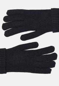 Sorte strikkede handsker med ribbet struktur. Har en tætsiddende manchet og fem-finger design for varme og komfort.