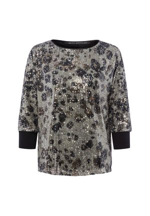Shiny, short-sleeve top with silver and black sequin leopard pattern, round neckline, and black ribbed cuffs. Textured fabric with shimmering accents.