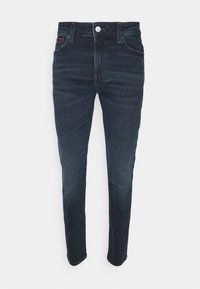 Tummansiniset farkut slim fit -mallilla, valmistettu denimestä, viidellä taskulla, nappikiinnityksellä ja hienovaraisella haalistumisella lahkeissa.