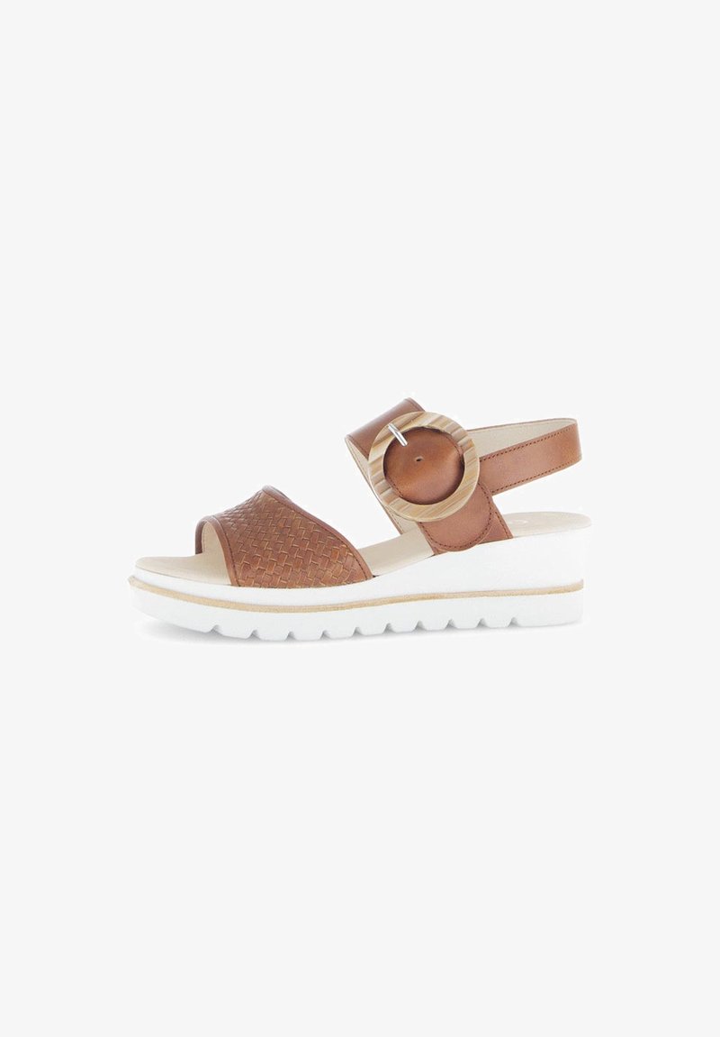 Bruine geweven leren sandalen met enkelbandje, ronde accent en een witte wigzool. Heeft een gestructureerde bovenkant en een zachte voering.