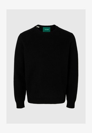 Czarny wełniany sweter z okrągłym dekoltem, długimi rękawami, prążkowanymi mankietami i dołem. Posiada zieloną metkę przy szyi z nazwą marki.