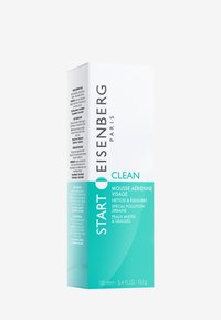 Eisenberg Paris ansigtsrensende mousse i en hvid og teal boks, med tekst på flere sprog. Størrelse: 100 mL. Rent, moderne design.