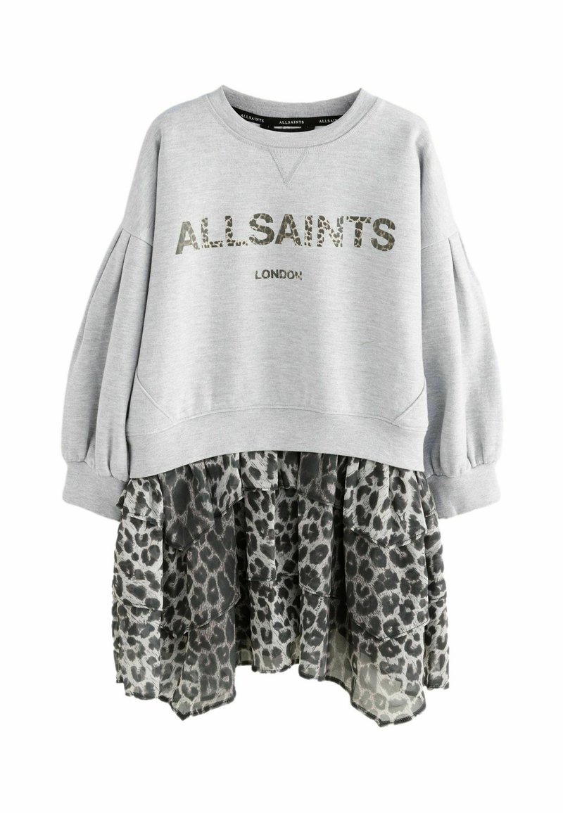 Hallide särk, millel on "ALL SAINTS LONDON" prinditud kamuflaažiga. Tootel on ruffled leopardimustriga seelik, mis on valmistatud läbipaistvast kangast, ja pikad puffitatud varrukad.