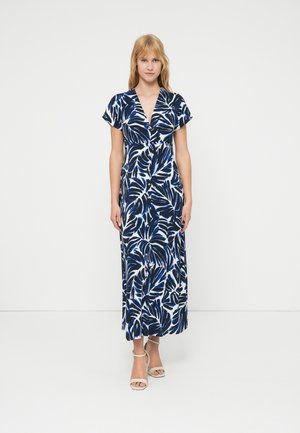 Maxi-jurk in marineblauw met witte bladpatronen, voorzien van een V-hals, korte kapmouwen en knopen aan de voorkant. Gladde stof met een vloeiende silhouet.