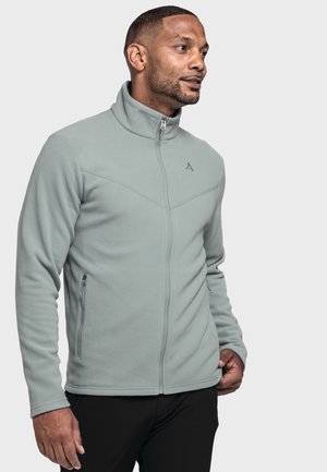 Light green fleece jacket with a high collar, zippered front, and two side pockets. Features a diagonal stitching pattern and logo detail.