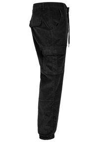 Pantalons cargo noirs avec une coupe ajustée, dotés de poches latérales, d'une taille ajustable et de poignets élastiques pour un look structuré.