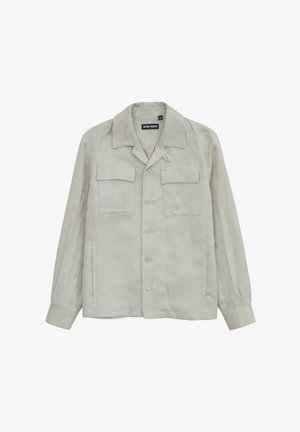 Lichtbeige overhemdjas met lange mouwen, spreadkraag, knoopsluiting aan de voorkant en twee borstzakken met klep.