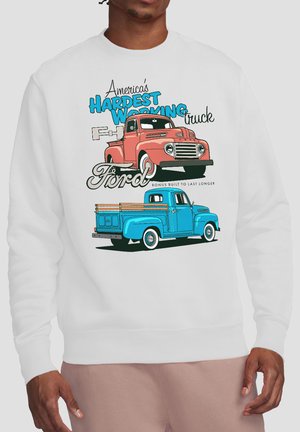 White sweatshirt with vintage red and blue Ford pickup trucks and text "America's hardest working truck Ford" printed on front.