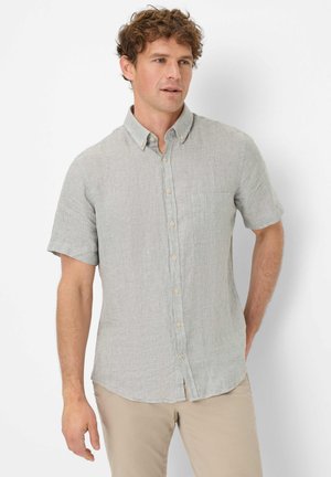 Short-sleeve button-up shirt in light gray, textured fabric with a check pattern, featuring a chest pocket and rounded hem.