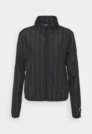 Black lightweight running jacket with full front zipper, high collar, vertical reflective Nike text stripes, and zippered pocket on left sleeve.