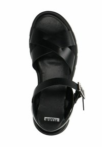 Black sandal featuring crisscross straps and an ankle buckle. Texture is smooth leather with a padded insole. Flat sole design.