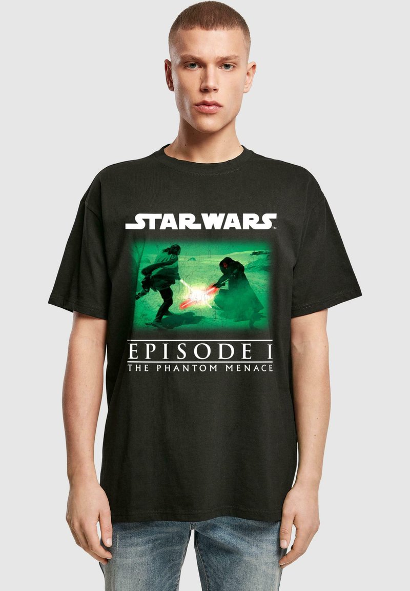 Schwarzes Baumwoll-T-Shirt mit einem "Star Wars: Episode I - Die dunkle Bedrohung"-Motiv mit lebendigen grünen und roten Akzenten. Normale Passform.
