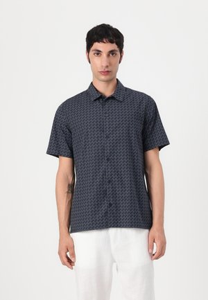 Short-sleeve, navy button-up shirt with a geometric white pattern. Made of lightweight fabric with a structured collar and relaxed fit.