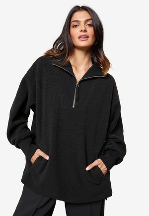 Suéter de forro polar - black