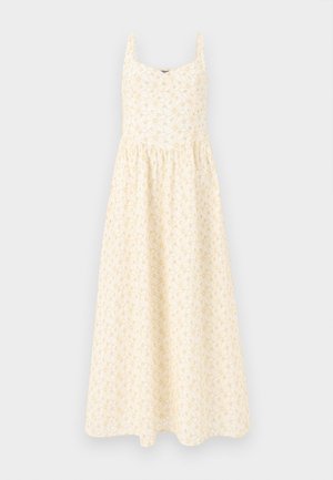 Robe longue sans manches couleur crème avec un motif floral jaune pâle et une taille froncée.