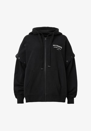 Zwarte zip-up hoodie met een ruim ontwerp, voorzien van drukknoopaccenten op de mouwen en voorzakken; zacht materiaal en minimale branding.