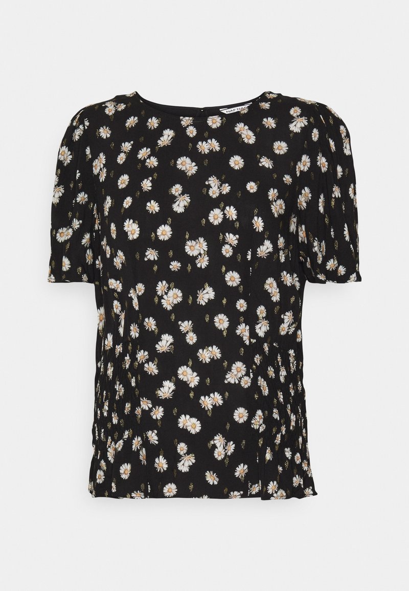 Blouse noire à manches courtes avec un motif floral de marguerites blanches et des épaules légèrement bouffantes, présentée sur un fond uni.