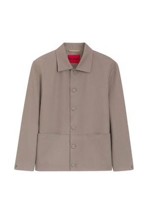 Taupe button-up jacket with a collar, long sleeves, two front pockets, and a red inner label reading "HUGO."